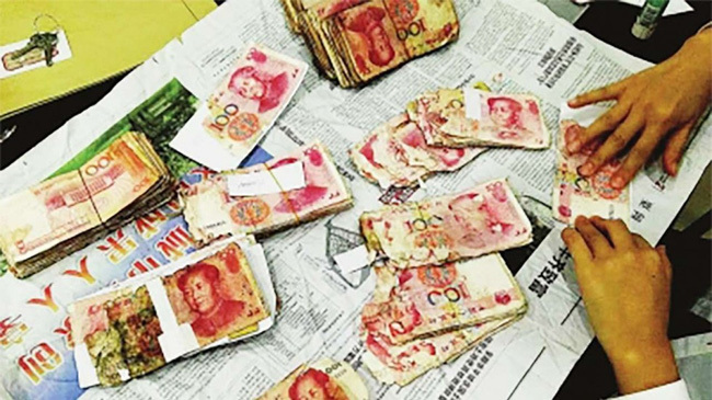  Người đàn ông Trung Quốc gần như mất trắng số tiền tiết kiệm
