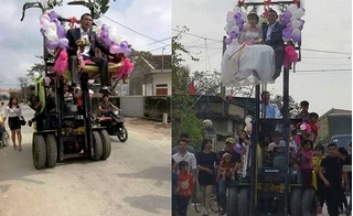 Đám cưới ở Nghệ An: Cô dâu, chú rể ngồi vắt vẻo trên xe nâng cao chạm dây điện