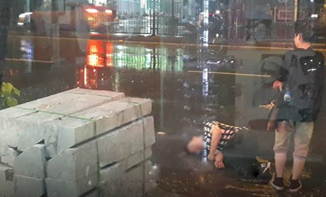 chàng trai cãi nhau với người yêu dưới mưa bão tại Hà Nội