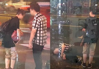 Cãi nhau với người yêu hàng giờ dưới mưa bão, chàng trai bỗng nằm lăn ra đường 