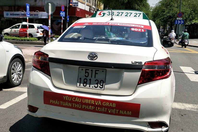 Sở GTVT đã chỉ đạo vụ taxi Vinasun phản đối Uber, Grab. Ảnh: Lao Động