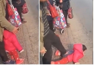 Bé gái 2 tuổi bị bố tát liên tục vào mặt và dẫm đạp giữa đường phố
