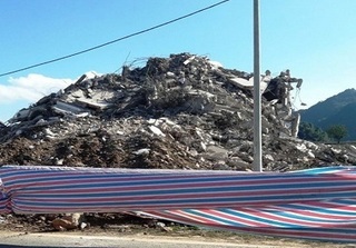 Tòa “Keangnam Tây Bắc” bị đánh sập hoàn toàn sau một tuần phá hủy