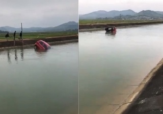 Đang lưu thông, xe ô tô 4 chỗ mất lái lao xuống sông chìm nghỉm