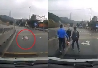 'Rớt tim' xem clip em bé bò ra giữa đường ở Quảng Ninh, tài xế 'xanh mặt' phanh gấp