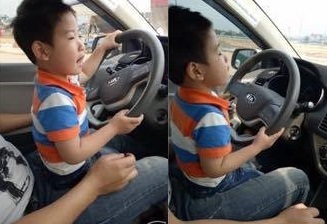 clip con trai 3 tuổi lái ô tô trên đường 2