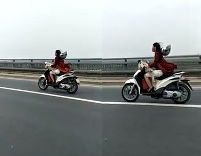 clip cô gái phóng xe máy bạt mạng trên cầu 