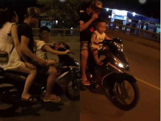 Clip: Bé trai 4 tuổi chở bố mẹ 'đầu trần' lao vun vút trên đường vào buổi tối