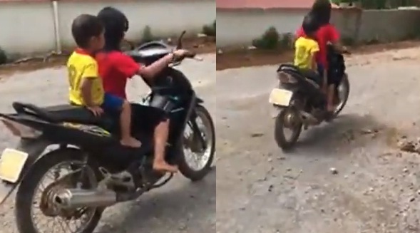 Clip bé gái 10 tuổi lái xe máy, chở theo em nhỏ phóng vun vút