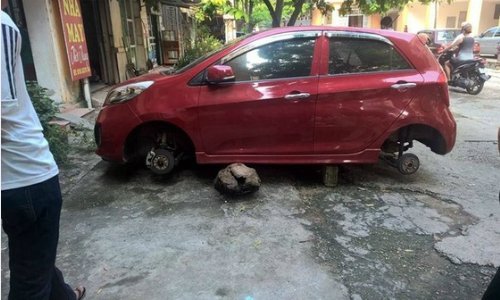 Kia Morning bị trộm tháo cả 4 bánh12