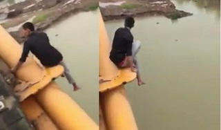 Gọi điện với bố rồi gieo mình xuống sông Cấm tự tử