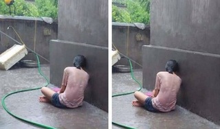 Bức ảnh 'day dứt' nhất ngày: Cô gái dầm mưa ướt sũng, ngồi khóc vì thất tình