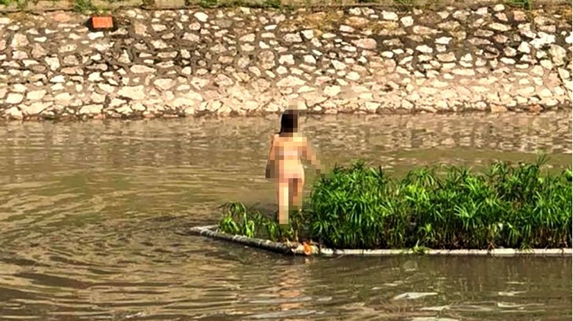 Thông tin bất ngờ vụ cô gái khỏa thân nhảy múa giữa sông Tô Lịch