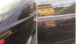 Chủ xe ô tô Camry bị cào xước mang xe lên hãng định giá thiệt hại