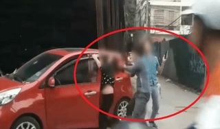 Nguyên nhân vụ chồng đánh đập vợ dã man trước mặt con giữa phố