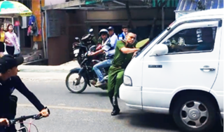 Tài xế đẩy cảnh sát hàng trăm mét trên phố Đà Lạt ra trình diện