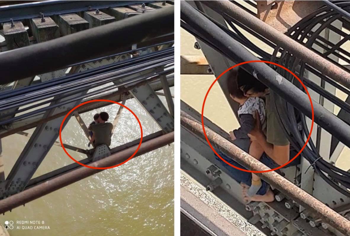 Hơn 1h nghẹt thở giải cứu thanh niên ôm con 7 tháng tuổi định nhảy cầu Long Biên