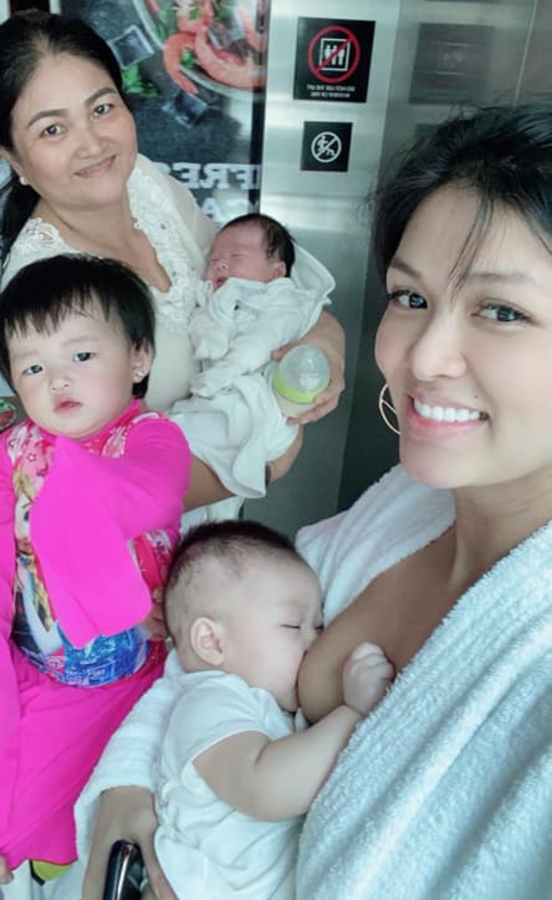 Hoa hậu Oanh Yến gây tranh cãi với hành động cho con bú trong thang máy