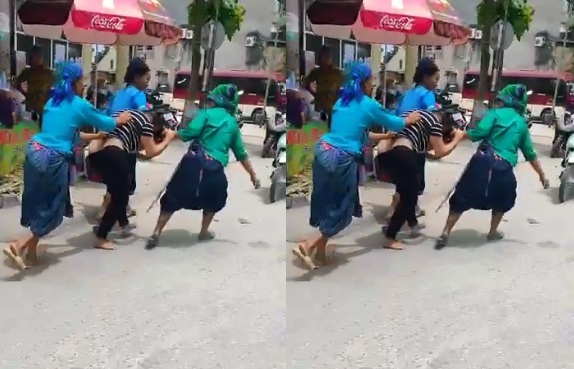 Clip cô gái dân tộc bị cắt quần áo đánh ghen giữa phố tại Hoàng Su Phì