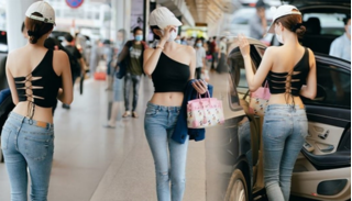 Ngọc Trinh nổi bật ở sân bay với áo crop top khoe eo con kiến