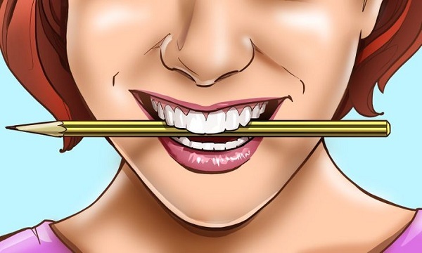 Vì sao ngậm một cây bút chì trong miệng có thể hạnh phúc hơn