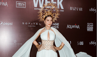 Lý Nhã Kỳ gợi cảm trên thảm đỏ Tuần lễ thời trang quốc tế Việt Nam