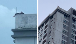 Cứu người đàn ông nằm vắt vẻo trên nóc chung cư 40 tầng ở Hà Nội