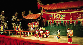 Âm nhạc dân gian trong múa rối nước - Hòa quyện trống chiêng và ca trù