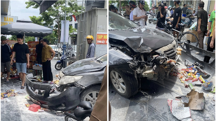 Người dân phá cửa, cứu tài xế mắc kẹt trong ô tô bốc cháy ở Nghệ An